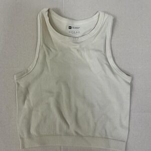 Minimalist‎ cream ribbed cropped tank top with a soft stretchy fit 🤍